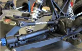 How does EV suspension compare to traditional suspension systems?